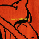 Kintaro Big Print Knit Sweater in orange and black - Individualist Lab - State Of Flux