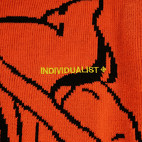 Kintaro Big Print Knit Sweater in orange and black - Individualist Lab - State Of Flux