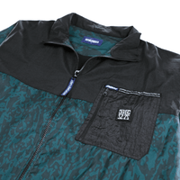 Micro Windbreaker Jacket in green and black - Devá States - State Of Flux