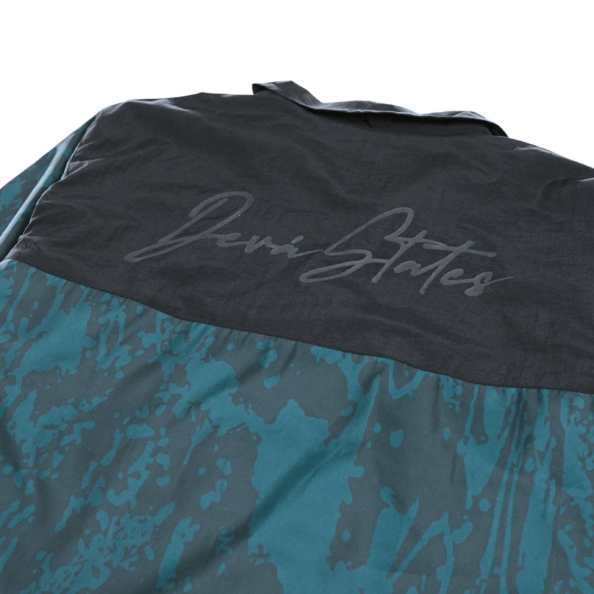 Micro Windbreaker Jacket in green and black - Devá States - State Of Flux