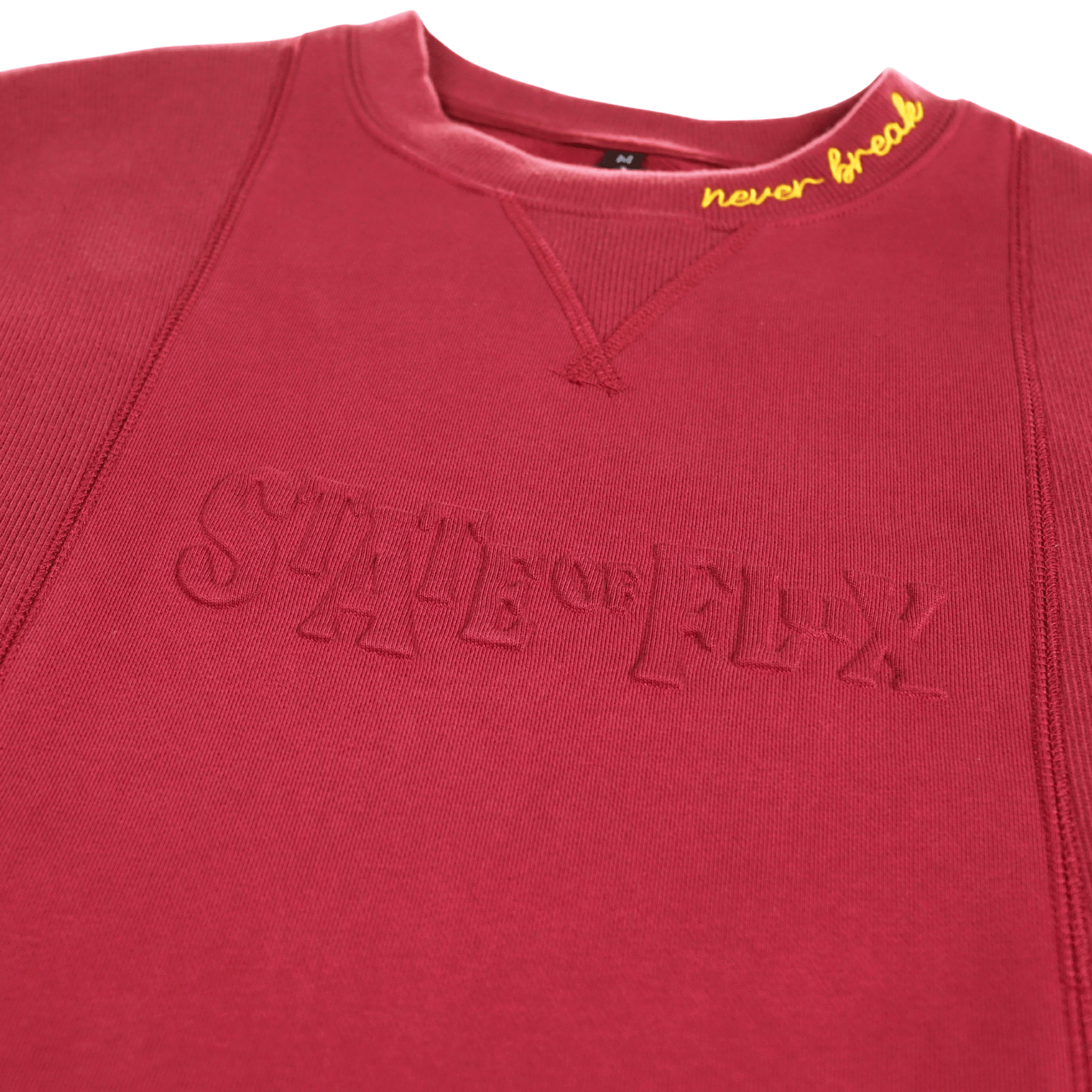 Never Break Embossed Crewneck in maroon - State Of Flux - State Of Flux