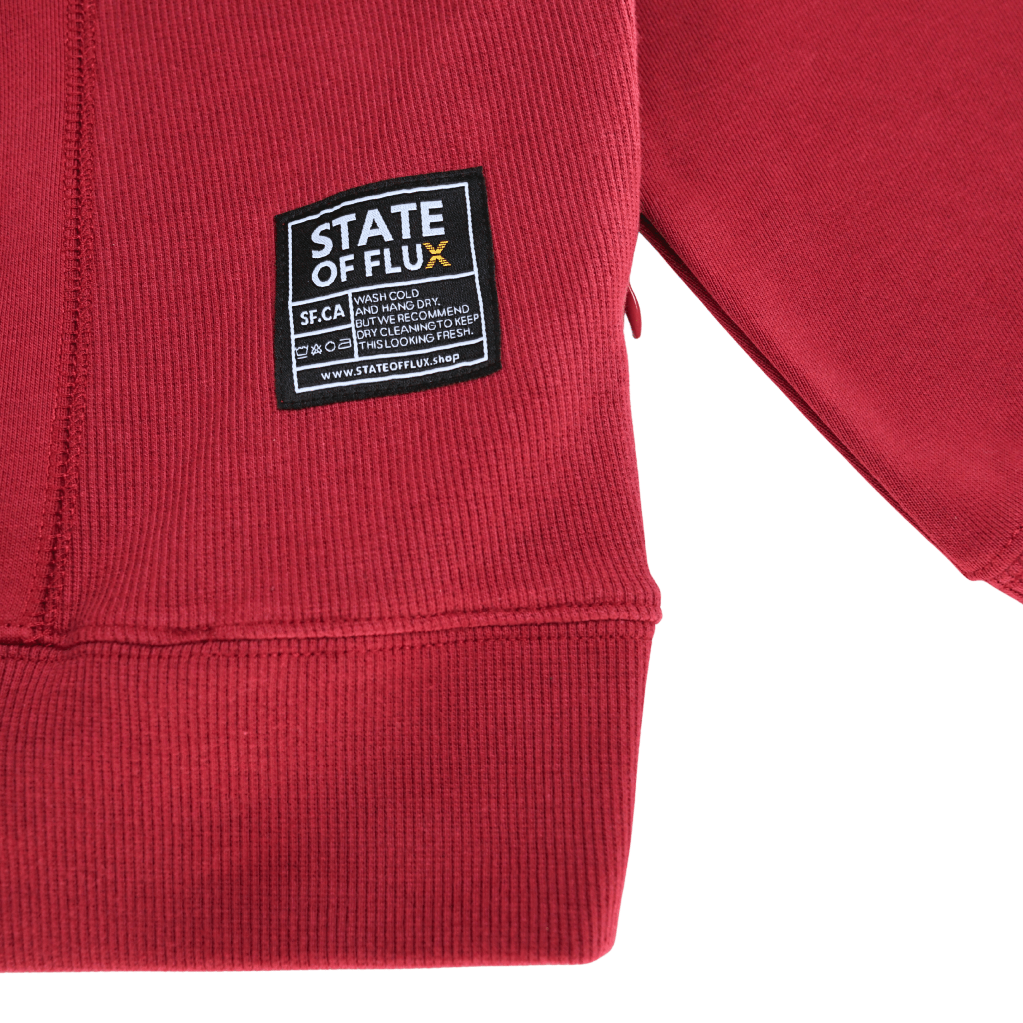 Never Break Embossed Crewneck in maroon - State Of Flux - State Of Flux