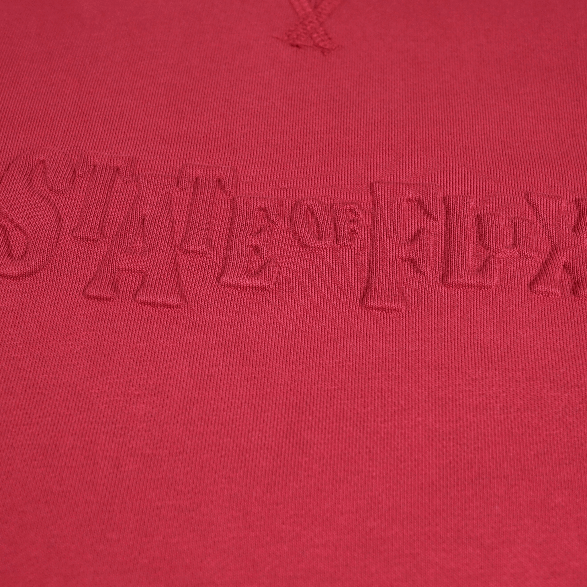 Never Break Embossed Crewneck in maroon - State Of Flux - State Of Flux