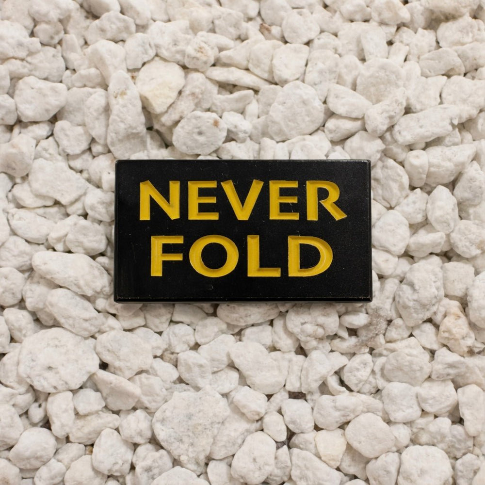 Never Fold Pin in black and yellow