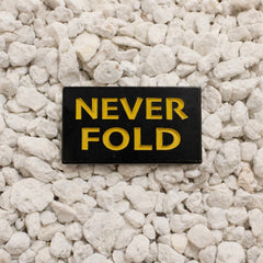 Never Fold Pin in black and yellow
