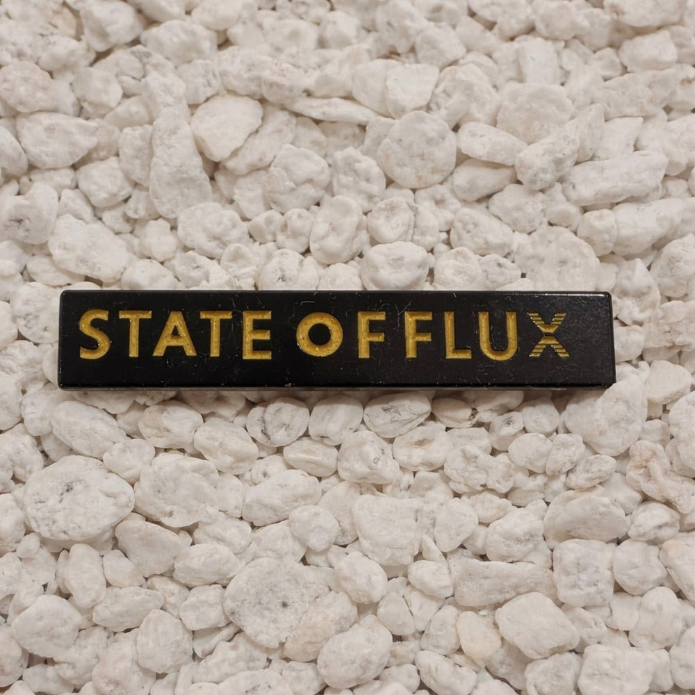SOF Pin in black and yellow
