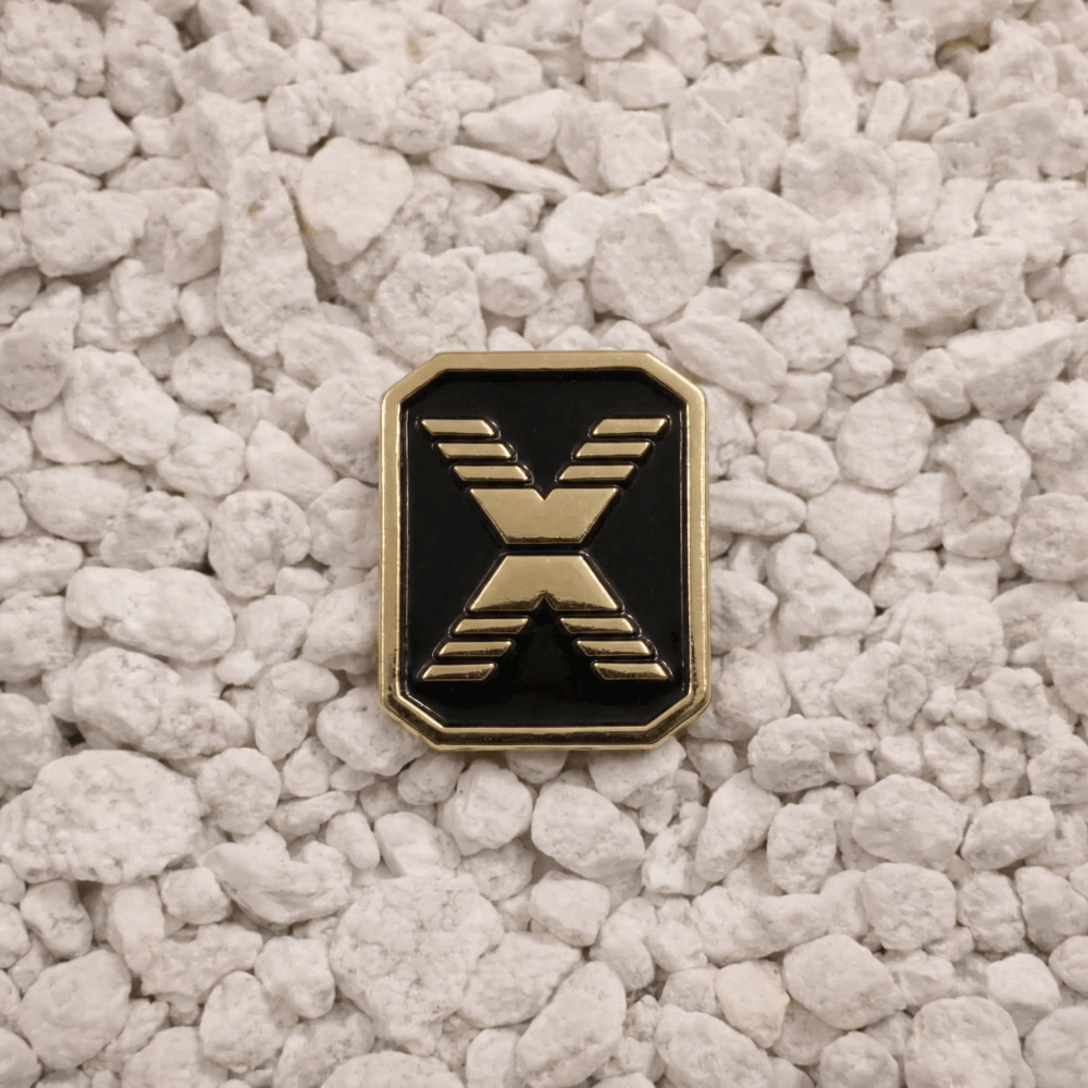 State Of Flux Logo Pin in black and gold