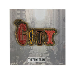 The City Pin in red and gold