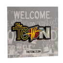 The Town Pin multi 1.5" hard enamel pin dual-post with black rubber backers blue yellow green grey black orange
