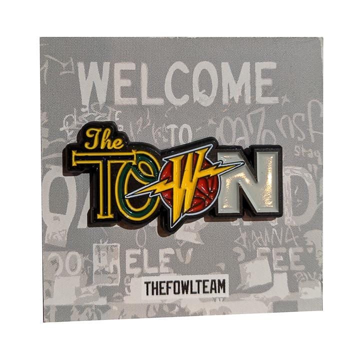 The Town Pin multi 1.5" hard enamel pin dual-post with black rubber backers blue yellow green grey black orange