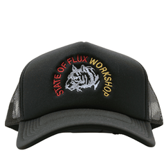 The Workshop Trucker Hat in black and white