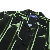 Thorn Short - sleeve Souvenir Shirt in black and bright green - Devá States - State Of Flux